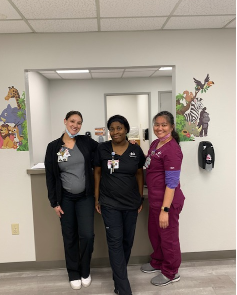 Three nurses in clinic